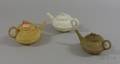 Wedgwood Caneware and Two Smear Glazed Teapots