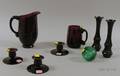 Seven Pieces of Assorted Amethyst Glass Tableware and a Green Blown Glass Float
