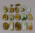 Sixteen Carved Jade Snuff Bottles