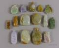 Fifteen Carved Jade Snuff Bottles