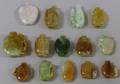 Fourteen Carved Jade Snuff Bottles