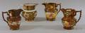 Four English Copper Lustre Jugs