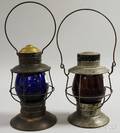 Two Metal Railroad Lanterns with Colored Molded Glass Globes