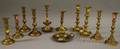 Four Pairs of Brass Candlesticks a Chamberstick and Two Candlesticks