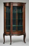 Late Victorian Serpentine Carved Oak and Mirrored China Cabinet