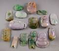 Approximately Sixteen Asian Carved Jade and Stone Pendants