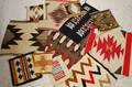 Twelve Small Navajo Rugs and Mats