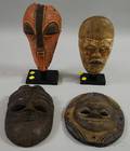 Four Wooden Carved Africanstyle Masks