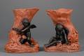 Pair of Wedgwood Rosso Antico and Black Basalt Figural Vases