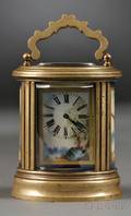 French Miniature Brass and Porcelainpaneled Carriage Clock
