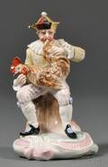 Dresden Porcelain Figure of a Jester with a Rooster