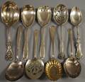 Nine Sterling Silver Serving Spoons
