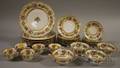 Twentyseven Piece Austrian Gilt and Handpainted Floraldecorated Porcelain Partial Luncheon Service
