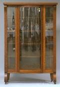 Early 20th Century Oak Swellfront China Cabinet