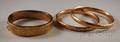 Three Victorian Engraved Gold and Goldfilled Bangles