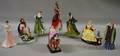 Eight Royal Doulton Porcelain Figures and Figural Groups