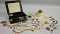Group of Costume Jewelry in a Toleware Jewelry Box