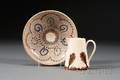Mochaware Cream Jug and Slipdecorated Earthenware Dish