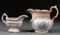 Blue Transferdecorated AntiSlavery Ironstone Pitcher and a Small Pitcher