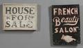 Two Painted Wood Advertising Signs