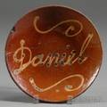 Redware Plate with Yellow Slip Daniel Inscription