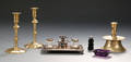 Three Brass Candlesticks Two Small Colored Glass Items and a Silver Plated Desk Set