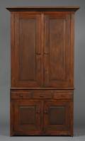 Brownpainted Pine Twopart Stepback Cupboard