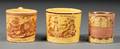 Three Yellowglazed Childrens Mugs