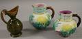 Pair of Majolica Water Lily Decorated Jugs and a Glazed Terracotta Ewer