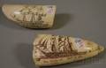 Two Scrimshawdecorated Whales Teeth