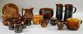Sixteen Pieces of Assorted Rockingham Glazed Pottery an Art Pottery Jardiniere and Tobacco Jar