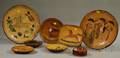 Eight Greg Shooner Glazed and Sgraffitodecorated Redware Items