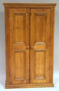 Stained Pine Paneled DoubleDoor Cupboard
