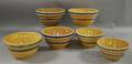 Six Blue and White Striped Yellowware Mixing Bowls