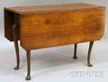 Pennsylvania Chippendale Carved Walnut Dropleaf Table with Trifid Feet