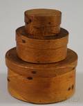 Three Small Round Graduated Lappedseam Covered Boxes