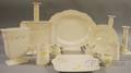 Fourteen Wedgwood Queens Ware Table Items