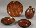 Three Glazed Redware Plates and an Ovoid Jug