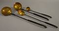 Four Wrought Iron and Brass Ladles and Spoons