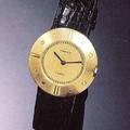 Montre bracelet ronde  lunette cnique 18K yellow gold gentlemans wristwatch Paris