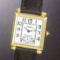 Montre bracelet carre  attaches Obus 18K yellow gold gentlemans wristwatch Paris