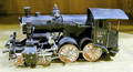 Folk art painted wood and tin locaomotive and coal tender ca 1900