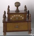 New England tiger maple and cherry spool cabinet ca 1830