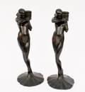 Pair of Bronze Frankart Figural Candlesticks