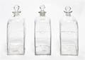 Three Case Blown Glass Decanters and Stoppers