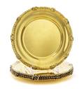 A Set of Four American SilverGilt Dinner Plates