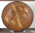 Pennsylvania slip decorated redware plate