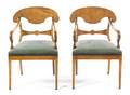 A Pair of Biedermeier Satinwood Armchairs