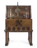 A Northern Italian Walnut Locking Chest on Stand
