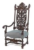 A Renaissance Revival Carved Mahogany Open Armchair